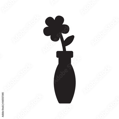 silhouette of vase with flower