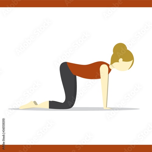 girl practising yoga in cat pose