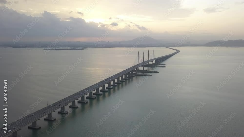 Aerial view Penang Bridge sunrise with car traffic. Aerial view Penang Bridge sunrise with car traffic.