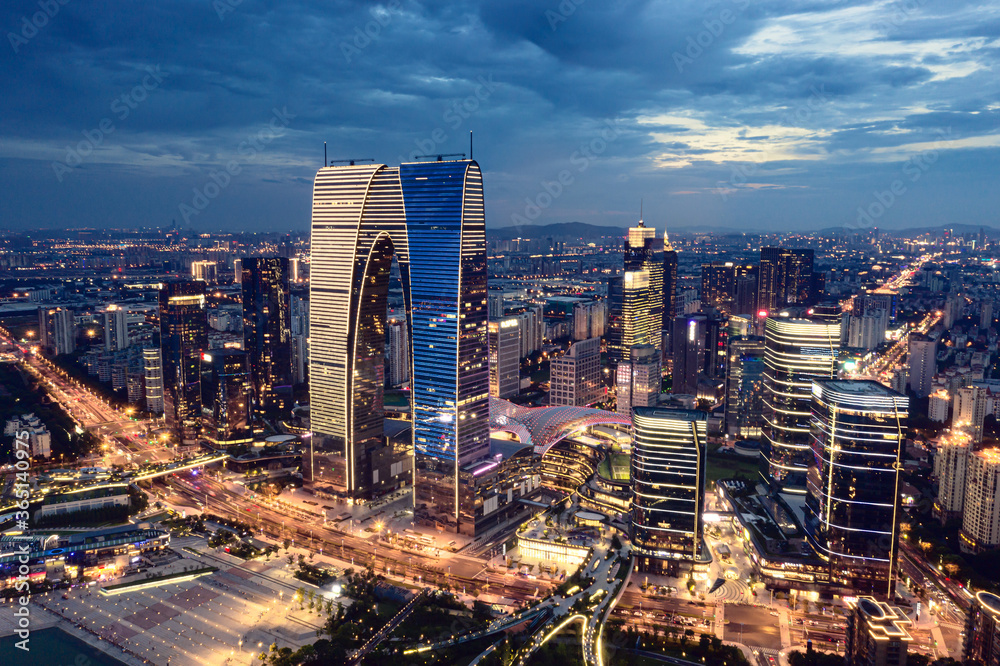 Fototapeta premium CBD buildings by Jinji Lake at night in Suzhou, China.