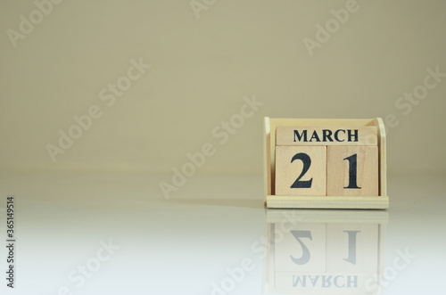 March 21, Number cube with the reflection on the ground.