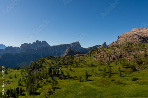 View of Croda da Lago mountain chain with Cima d'Ambrizzola peak and Lastoni di Formin mountain massif as seen from the trail to Nuvolau refuge, Dolomites, South Tirol, Italy.