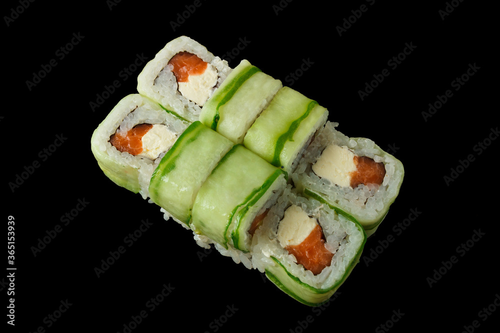 Japanese food: Set of salmon sushi and rolls with salmon and eel Japanese food: Set of salmon sushi and rolls with salmon and eel