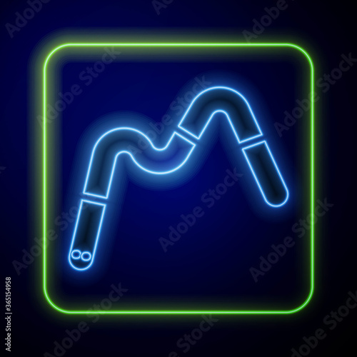 Glowing neon Jelly worms candy icon isolated on blue background. Vector.