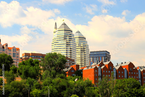 Fényképezés Beautiful spring and summer view of big city, buildings, white skyscrapers and a park in the Dnipro city from the Monastery Island