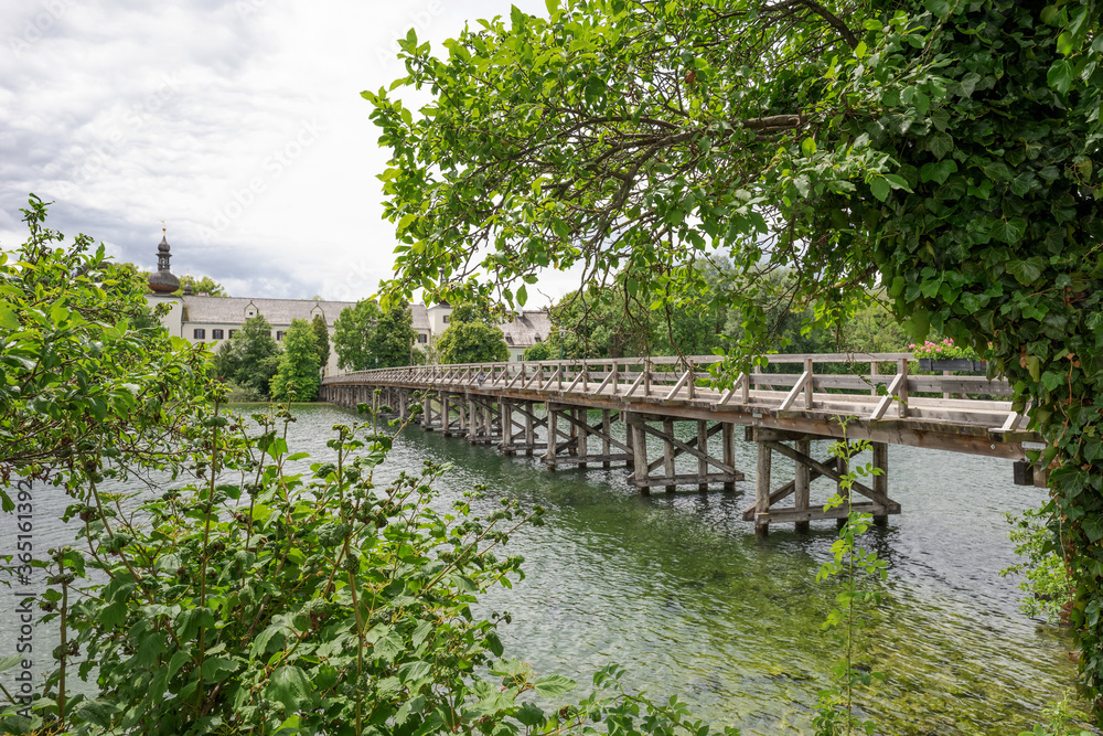 Wooden bridge between the castle named Ort and the city Gmunden. Austria Wooden bridge between the castle named Ort and the city Gmunden. Austria