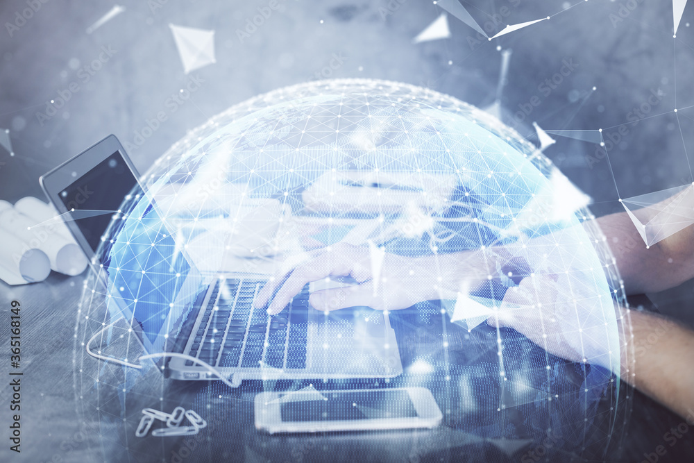 Multi exposure of businessman working on laptop on background. International business hologram in front. Concept of success. Multi exposure of businessman working on laptop on background. International business hologram in front. Concept of success.