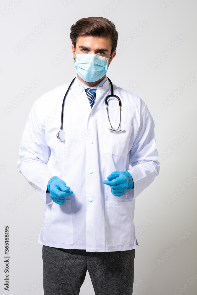 doctor with uniform, mask protection and medical gloves
