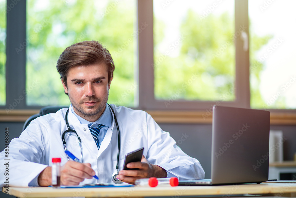 Fototapeta premium profesional doctor working at his desk collecting data