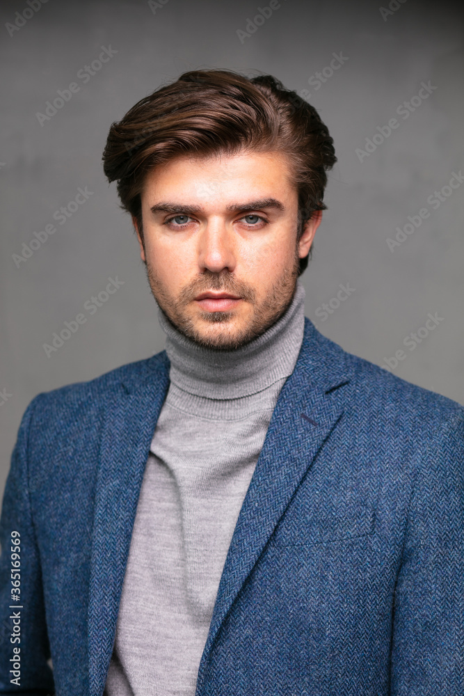 Obraz premium elegant stylish man on grey