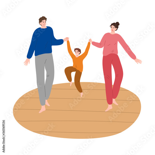 Parents hanging little son on hands and having fun at home