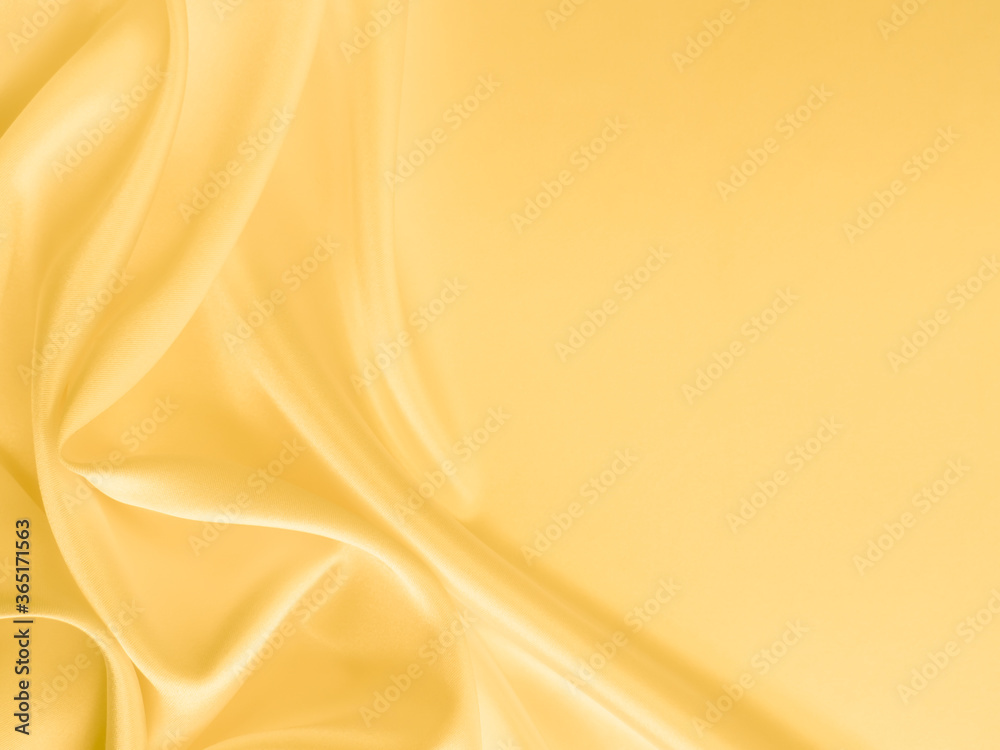 Beautiful smooth elegant wavy light yellow satin silk luxury cloth fabric texture, abstract background design. Copy space. Wedding, engagement concept. Beautiful smooth elegant wavy light yellow satin silk luxury cloth fabric texture, abstract background design. Copy space. Wedding, engagement concept.