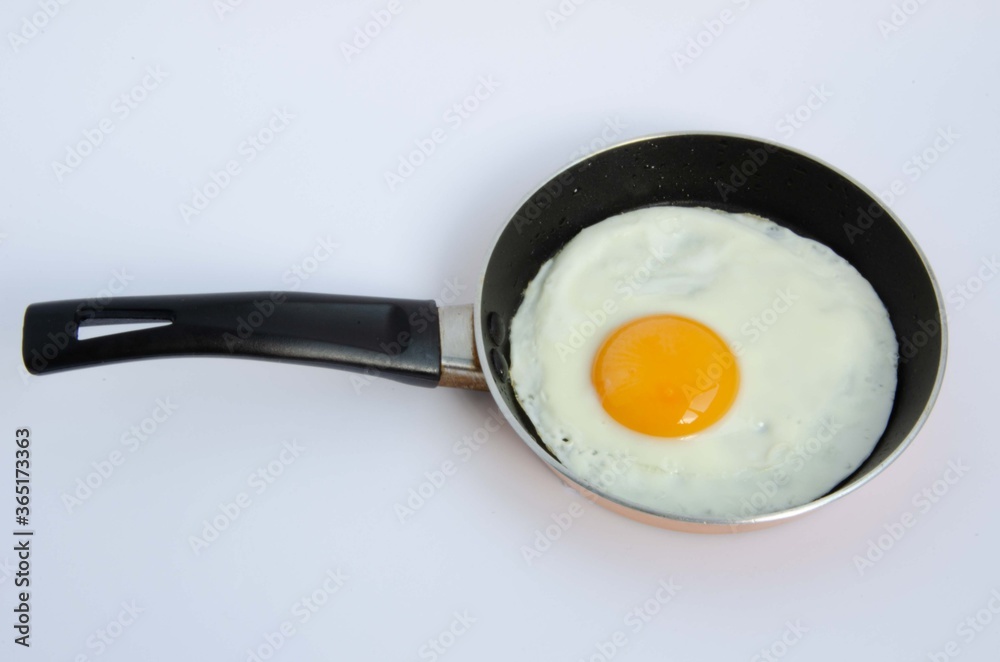 Fried egg in a small children's pan Fried egg in a small children's pan