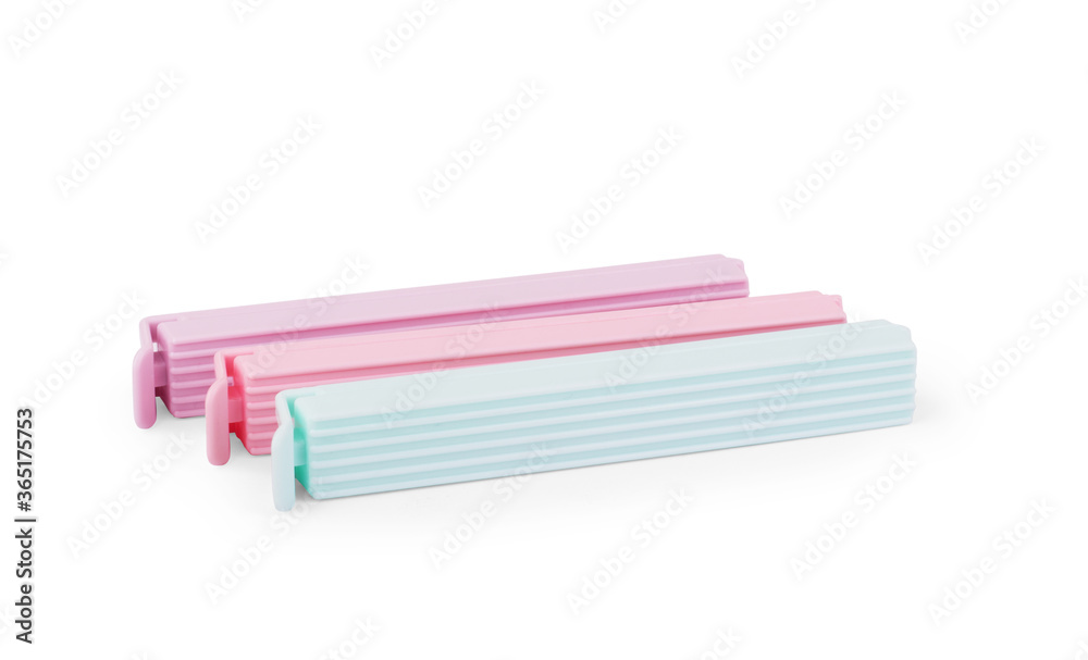 Plastic bag clips on a white background Plastic bag clips on a white background