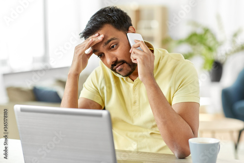 Quadro em tela technology, communication and remote job concept - indian man calling on smartph