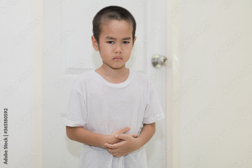 Asian little boy have stomachache
Asian little boy have stomachache