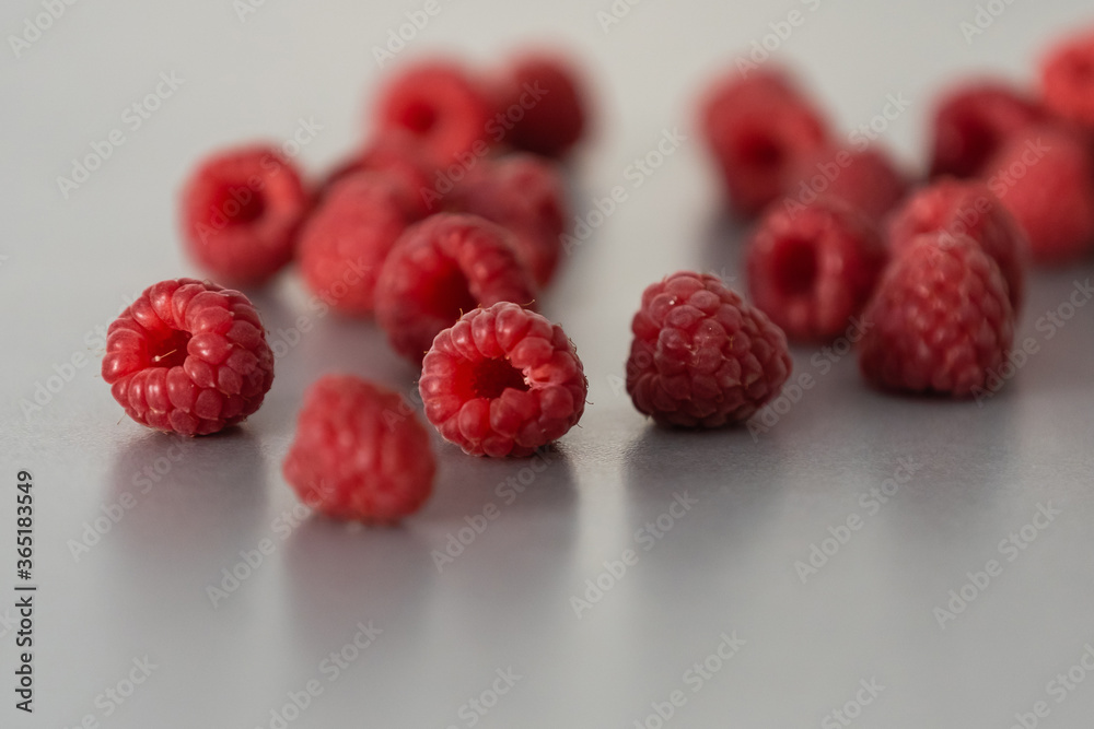 red Raspberry fruit on gray background red Raspberry fruit on gray background