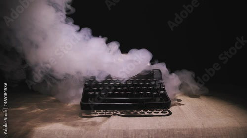 Old typewriter in the old room, retro interior, old style.