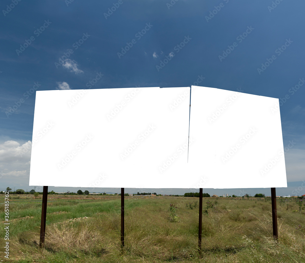Old billboard in the field with blue sky Old billboard in the field with blue sky