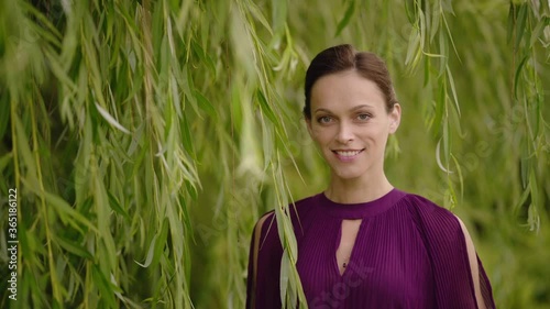 Beautiful young woman is enjoying life in nature