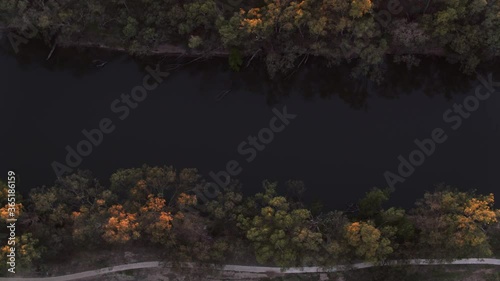 Aerial top down flying along the Murrumbidgee River at sunrise in the rural city of Wagga Wagga New South Wales Australia. photo