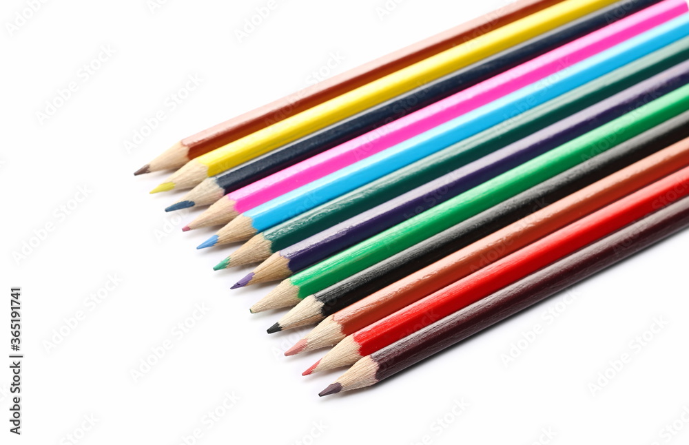 Colorful pencils set arrangement, row isolated on white background