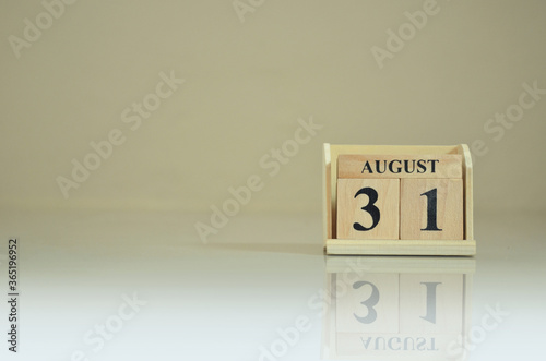 August 31, Number cube with the reflection on the ground.