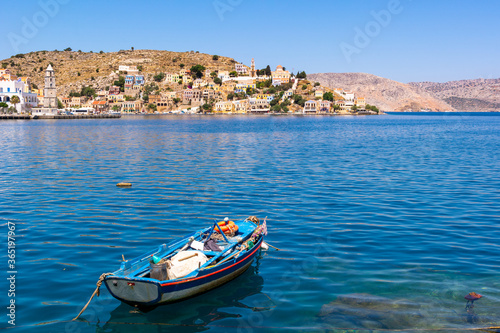 The beautiful island of Symi with a turquoise bay. Dodecanese, Greece