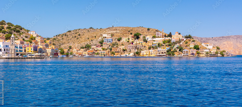 Beautiful island of Symi with a turquoise bay. Dodecanese, Greece