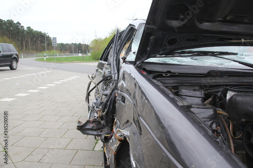 Car after crash damaged passenger side