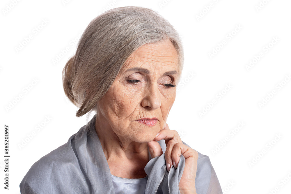 Close-up portrait of sad senior woman isolated Close-up portrait of sad senior woman isolated