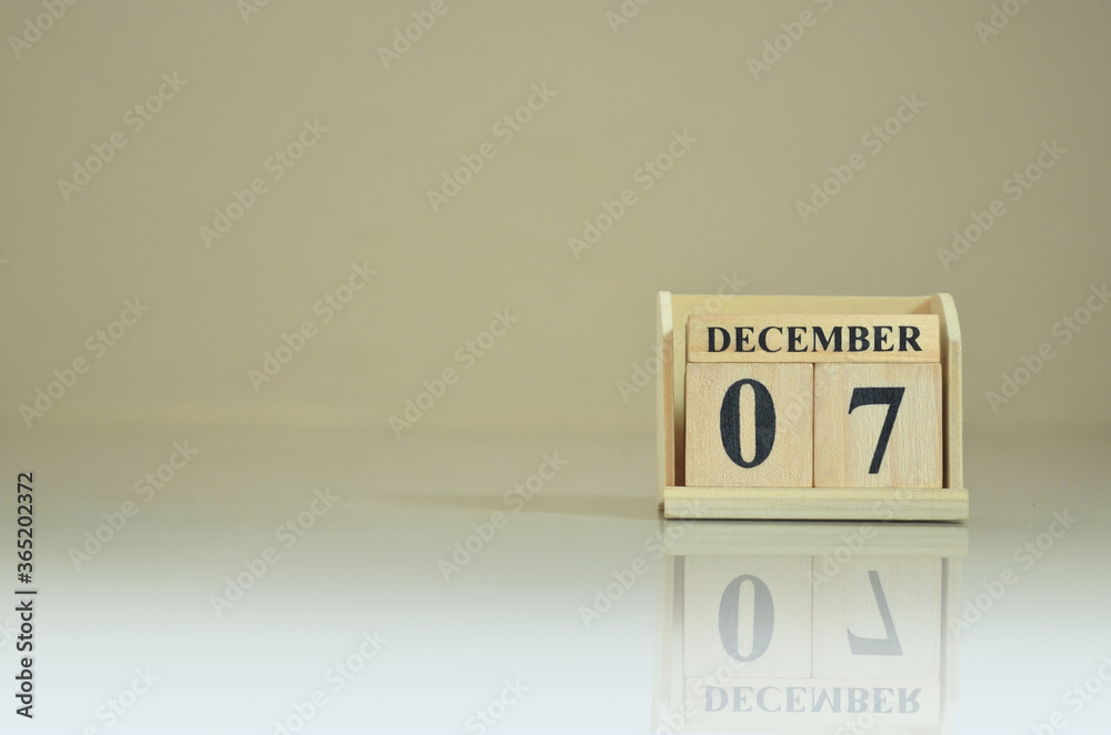December 7, Number cube with the reflection on the ground. December 7, Number cube with the reflection on the ground.