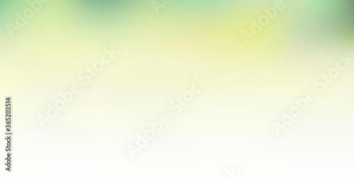 Light green, yellow vector abstract blur texture.