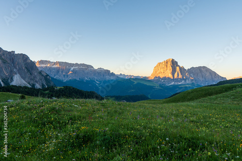 Dolomite mountain landscape at sunrise from Seceda peak  Italy.