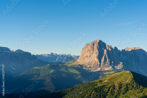 Amazing view from Seceda peak. Trentino Alto Adige, Dolomites Alps, South Tyrol, Italy, Europe. Picturesque panoramic view on Odle - Geisler mountain group, Seceda and Seiser Alm (Alpe di Siusi)