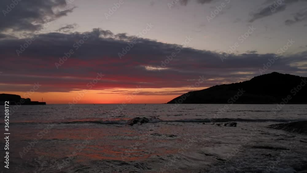 Sunset on the beach with clouds Sunset on the beach with clouds