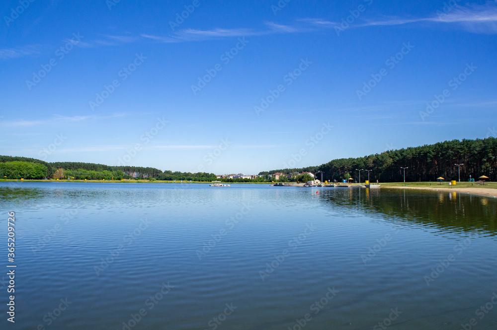 Blue lake with sky reflection in the water