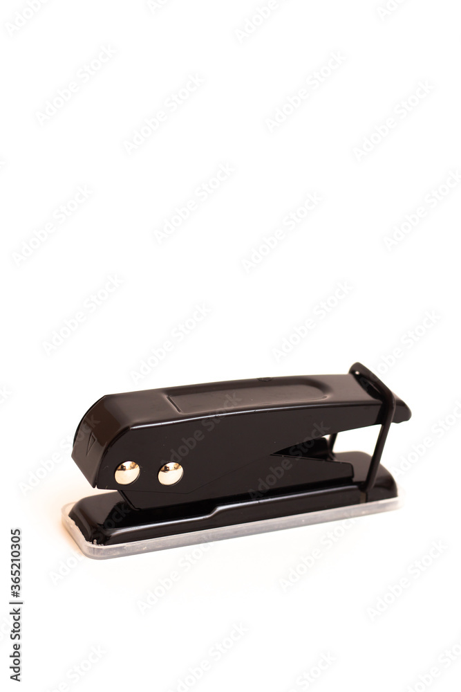 Hole punch on a white background. Kantseoyaria. Isolate Hole punch on a white background. Kantseoyaria. Isolate