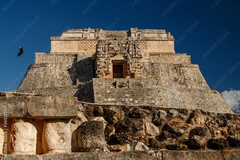 Main pyramid with flying condor in Uxmal site in Mexican Yucatan