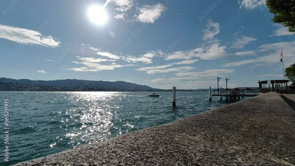 Lake Zurich with motor boat and blue sky Lake Zurich with motor boat and blue sky