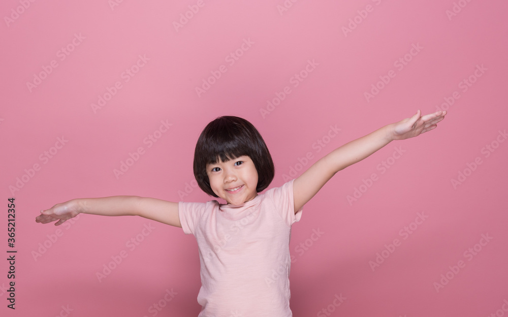 happy kid on pink background, portrait child
happy kid on pink background, portrait child