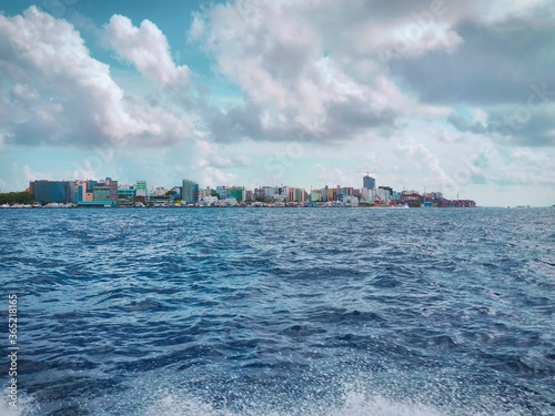 Maldives Capital City Skyline and Harbour, as Seen from the Indian Ocean on a Speedboat - Approaching Malé City
