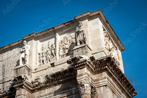 Close-up details of relief panels, round reliefs, and frieze on the attic of The Arch of Constantine, a triumphal arch in Rome, Italy