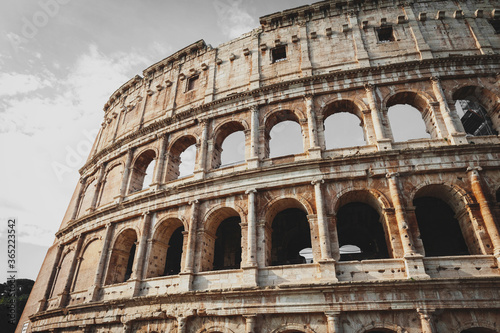 Architectural details of the facade of the Colosseum (Coliseum) or Flavian Amphitheatre, the largest Roman amphitheater located in city of Rome, Italy