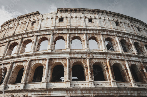 Architectural details of the facade of the Colosseum  Coliseum  or Flavian Amphitheatre  the largest Roman amphitheater located in city of Rome  Italy