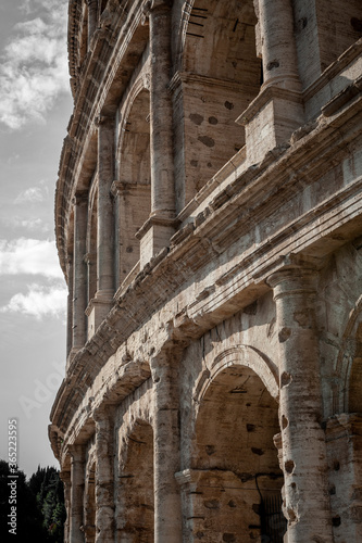Architectural details of the facade of the Colosseum (Coliseum) or Flavian Amphitheatre, the largest Roman amphitheater located in city of Rome, Italy