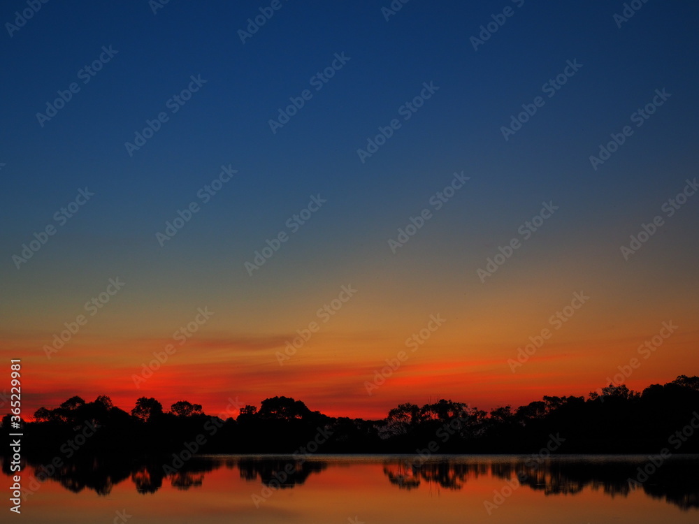 Peaceful lake at sunset with reflection in Australia