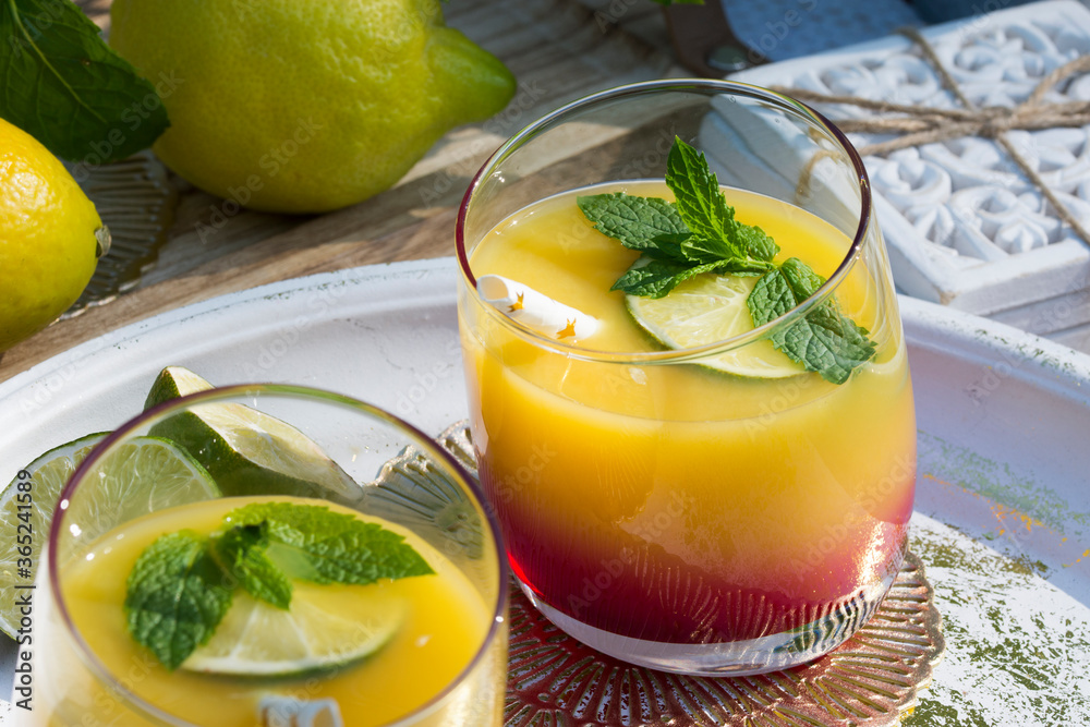 Tequila sunrise coctail on a hot sunny day. Tequila sunrise coctail on a hot sunny day.