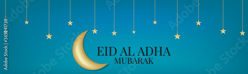 Eid Al Adha Mubarak banner or header. Muslim holiday of sacrifice. Islam religious celebration. Arabic design concept. Golden stars and moon, calligraphy lettering on blue background.
