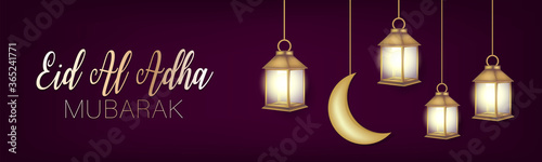 Eid Al Adha Mubarak banner or header. Muslim holiday of sacrifice. Islam religious celebration. Arabic design concept. Golden lantern, moon and stars, calligraphy lettering on purple background.
